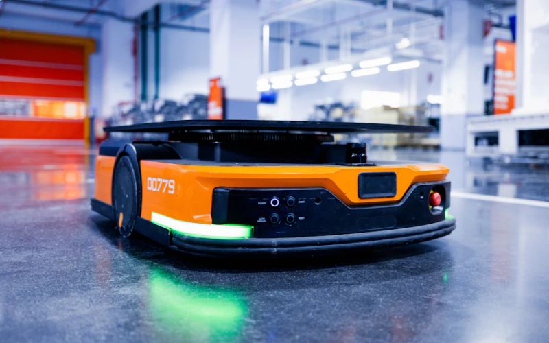 An autonomous mobile robot on a warehouse floor