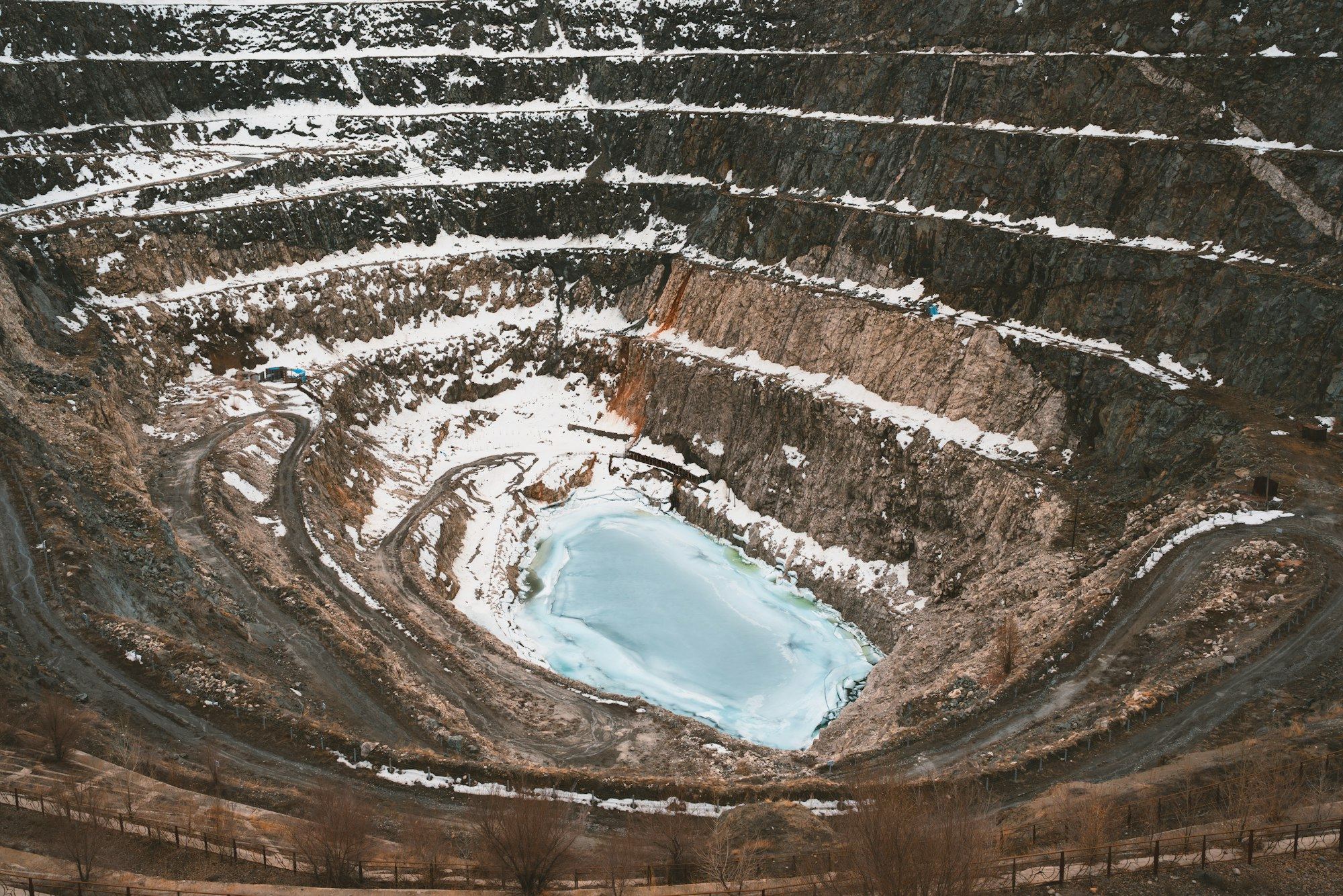 Aerial view of a large open-pit mine