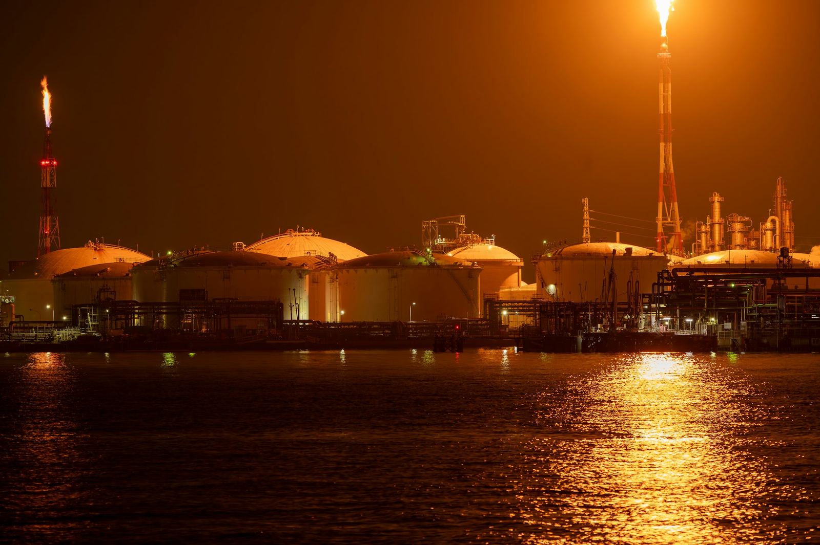 An oil refinery lit up at night